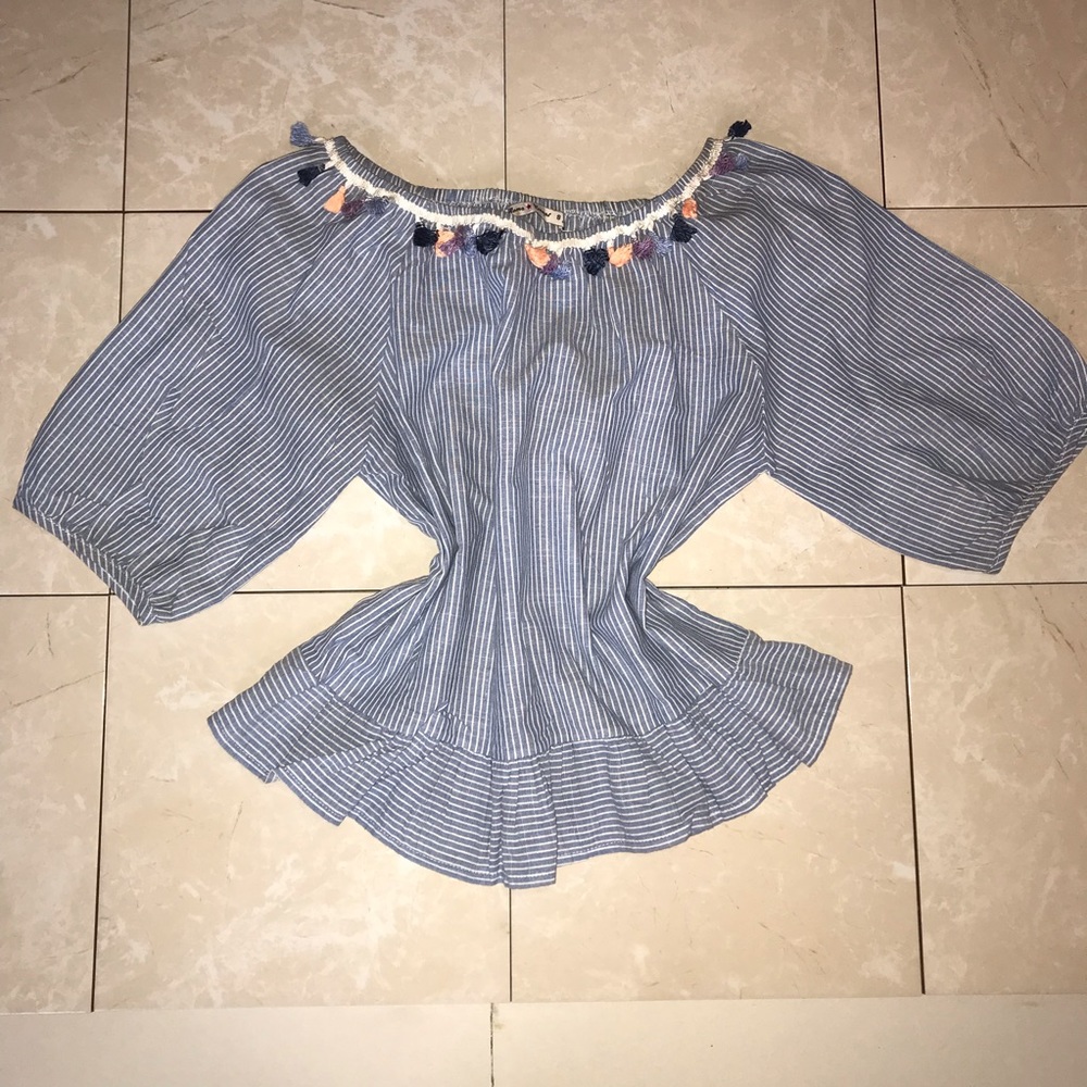 Blue blouse with white stripes and tassels